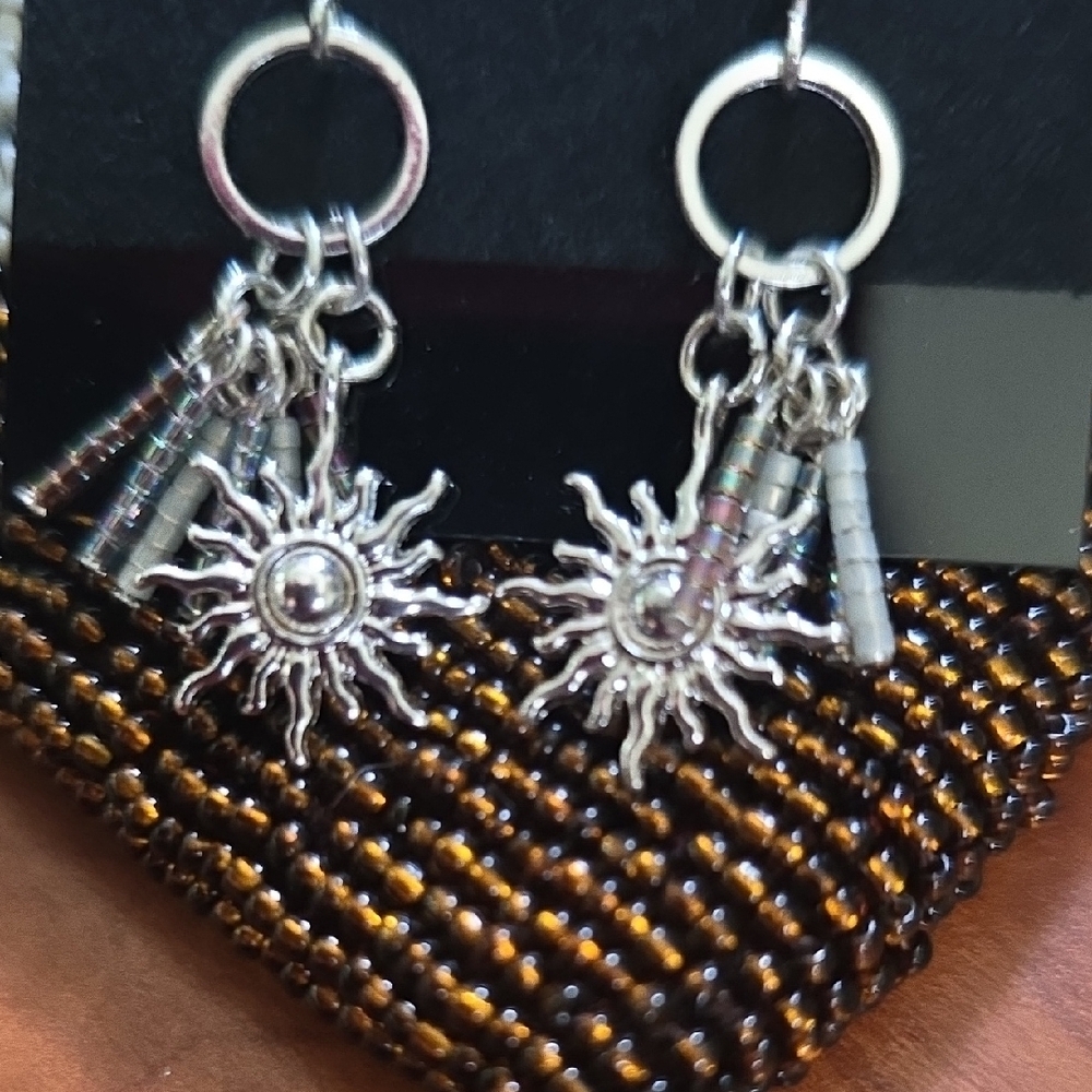 Elegant Silver Sun Charm Earrings - Picture 5 of 5